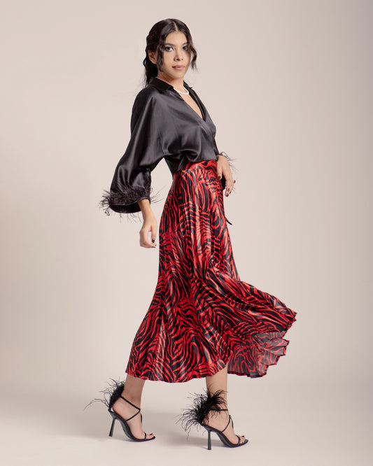 FALDA PLISADA ANIMAL PRINT ROJO